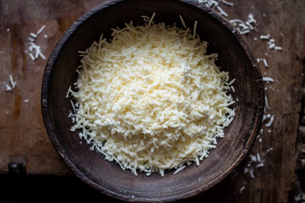 Shredded cheese blend for a creamy mac and cheese sauce.